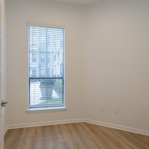 a spacious nook with a large window