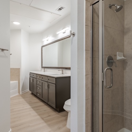 a spacious bathroom with a walk-in shower