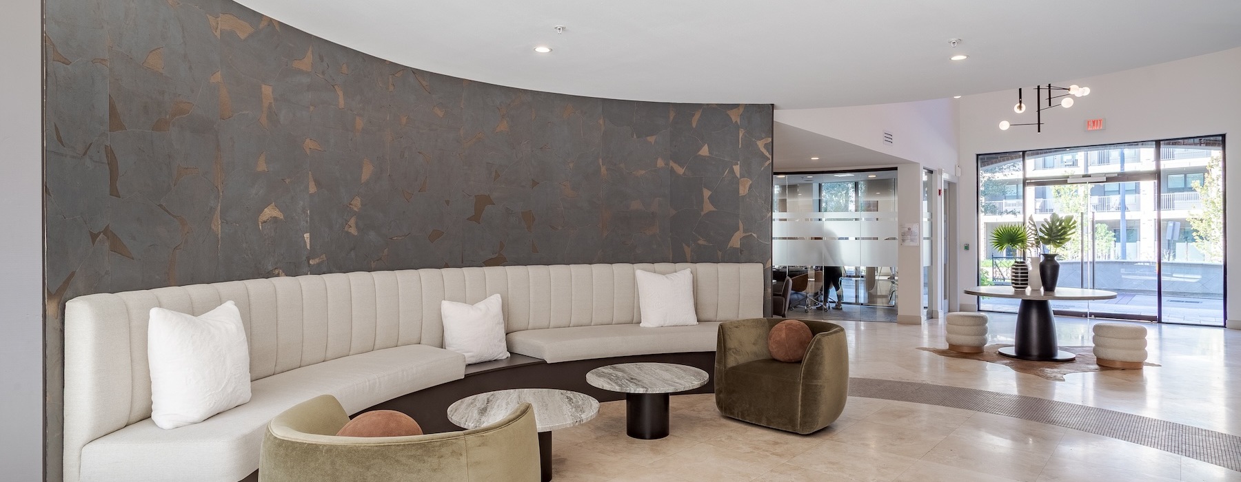 a spacious lounge with ample lighting