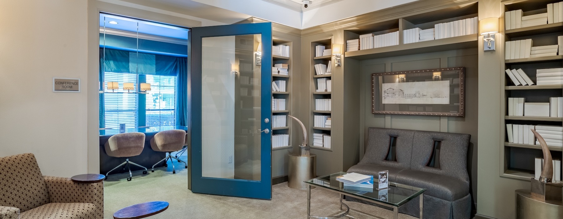 a resident lounge with a large sofa